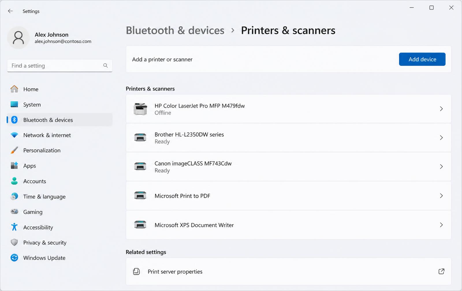 Windows 11 Printers & scanners settings with one printer showing the status Offline.